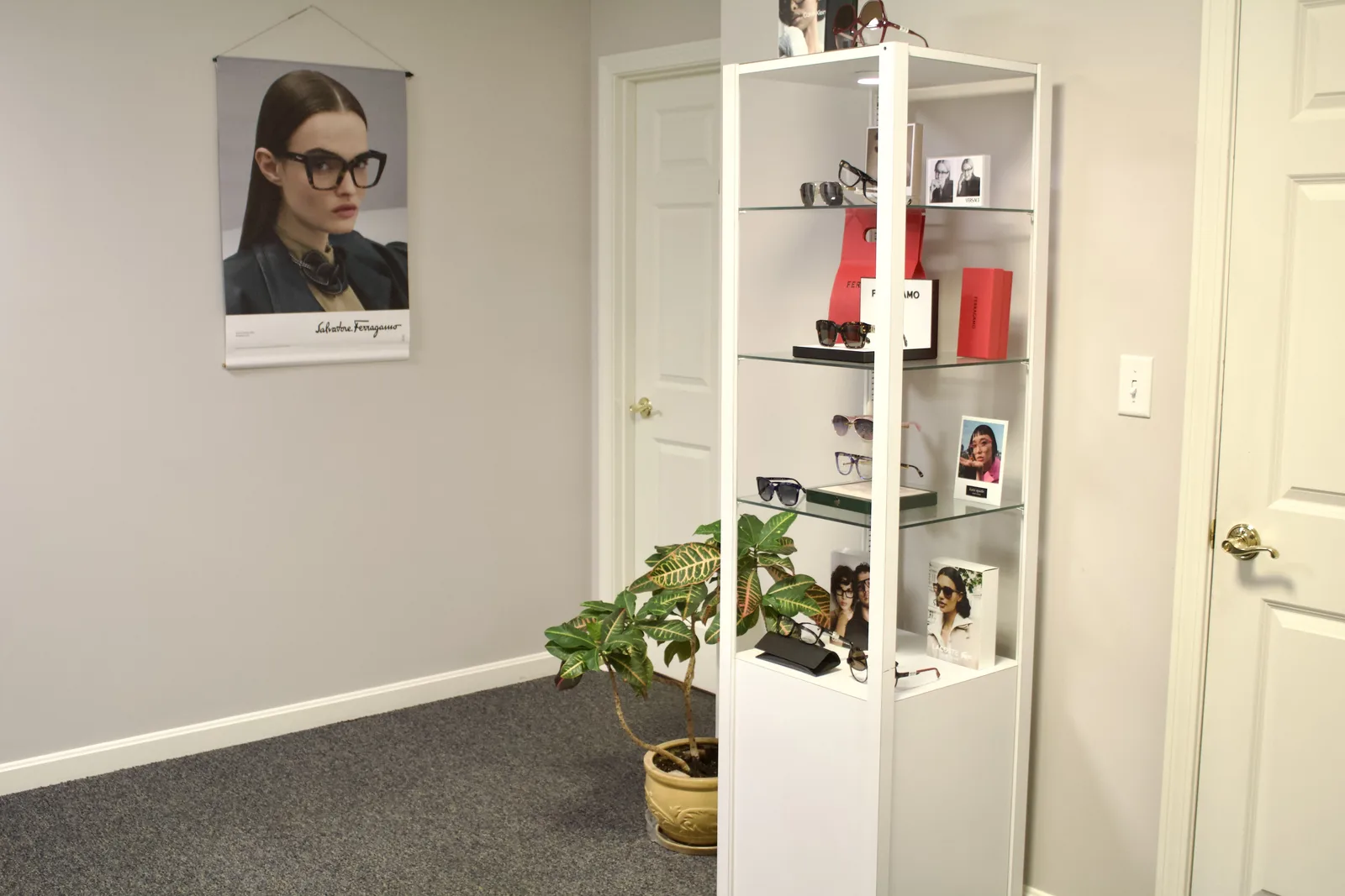 Designer eyewear display cabinet in the Smithfield optical showroom.